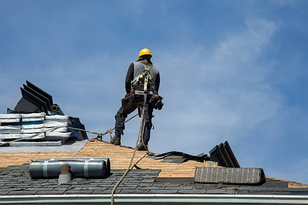 Professional Roof Replacement technician working in Bayside, WI